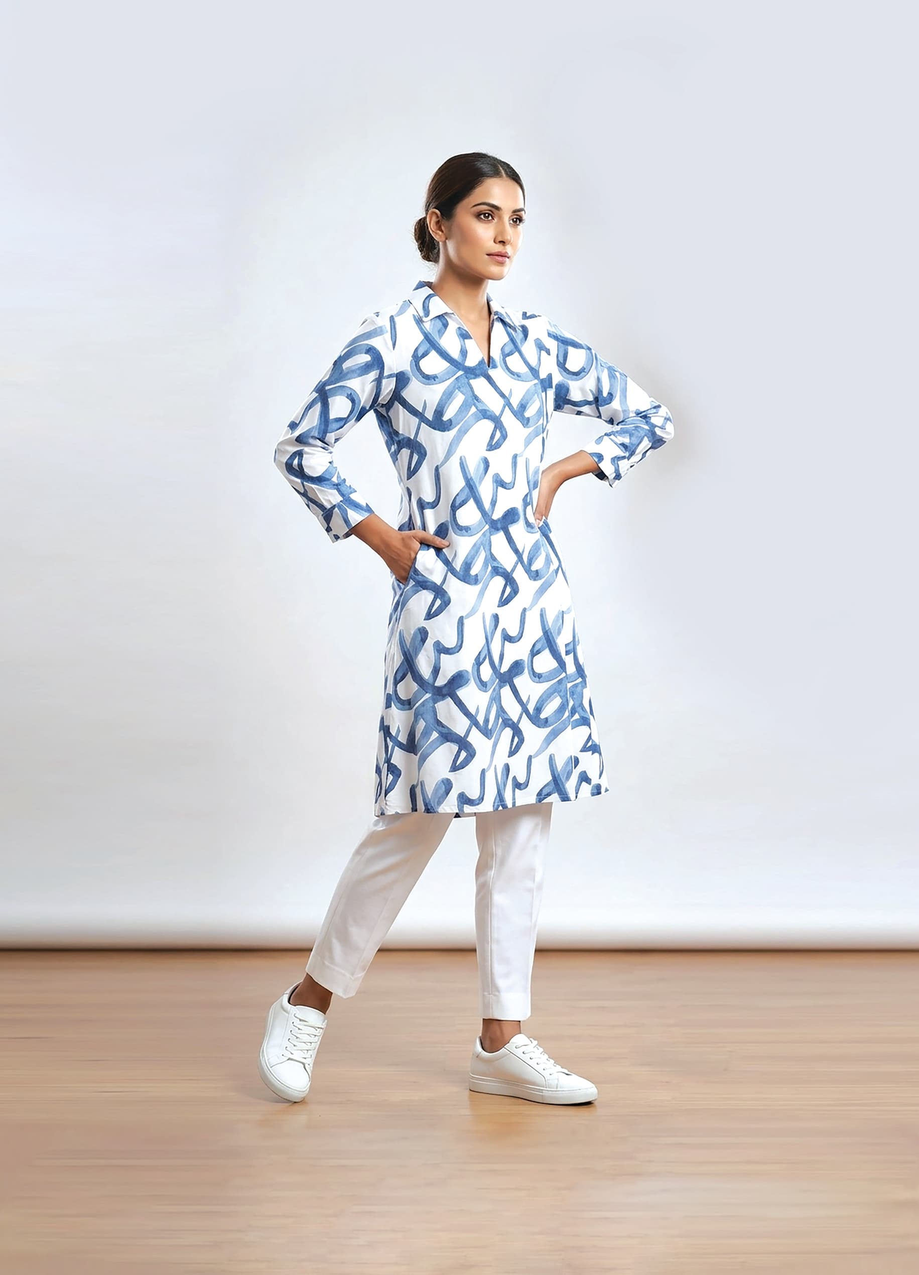 Anjali — Ivory A-line shirt dress in a brushed indigo calligraphy print