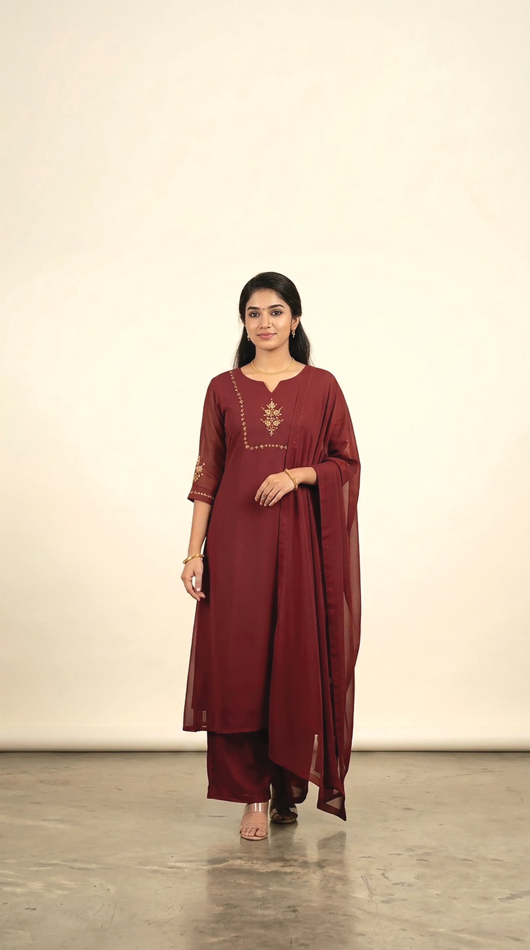 Kavya — Wine kurta set with a gold floral-spray yoke and a sheer dupatta