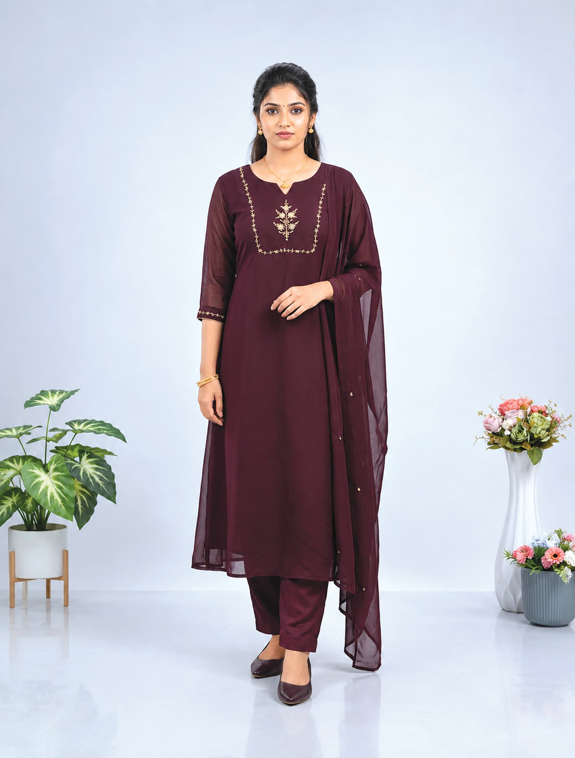 Lakshmi — Deep-purple kurta set with a gold floral-spray yoke and a sheer dupatta