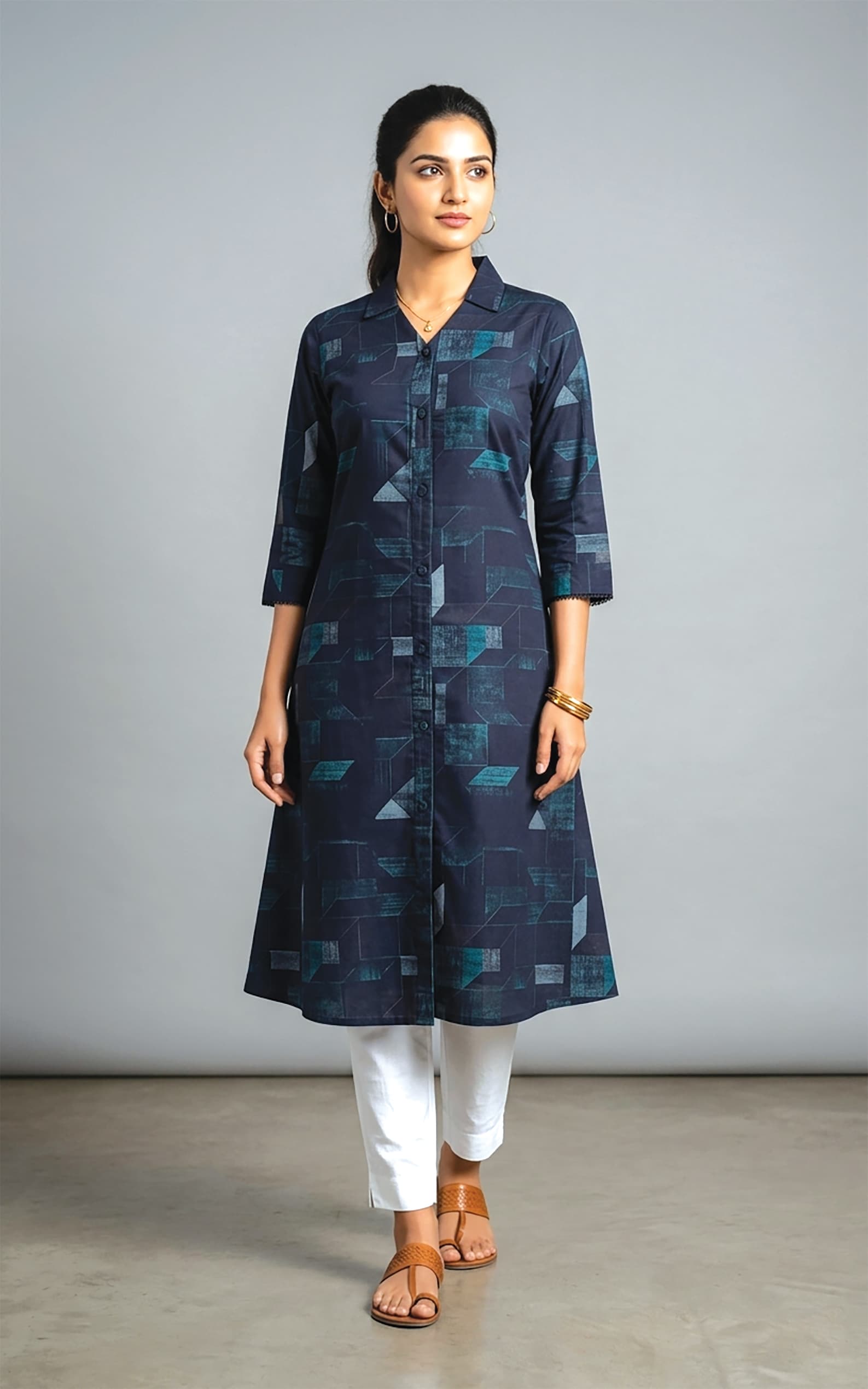 Saraswathi — Collared shirt-kurta in a teal-toned geometric patchwork print