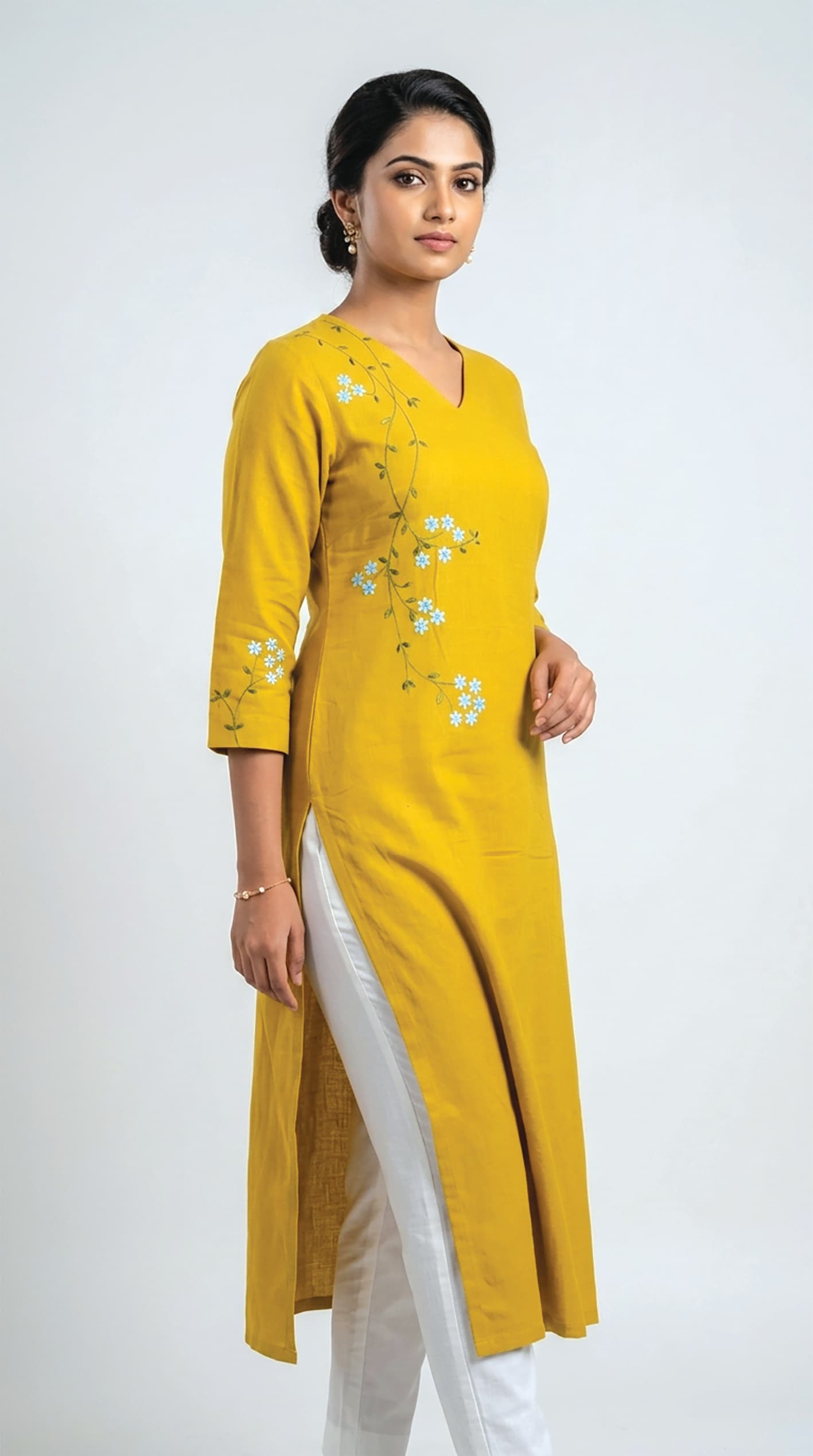 Mustard kurta with a single-side floral vine embroidery