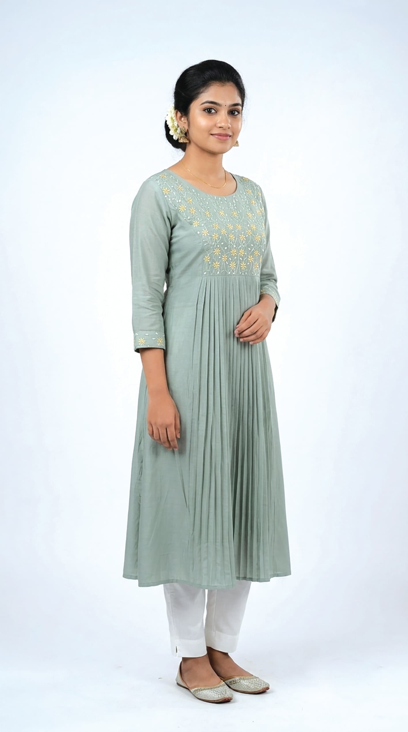 Haritha — Mint pintuck-pleated kurta with a round embroidered floral yoke