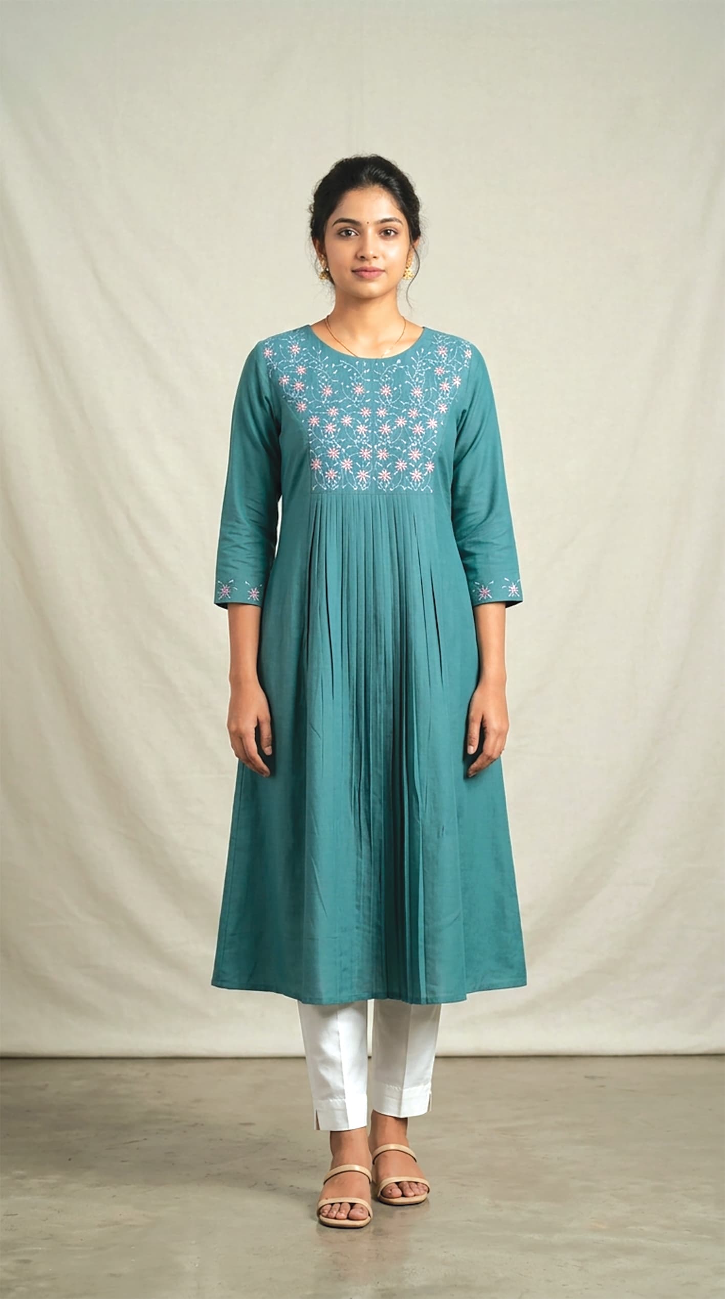 Keerthana — Teal pintuck-pleated kurta with a round embroidered floral yoke