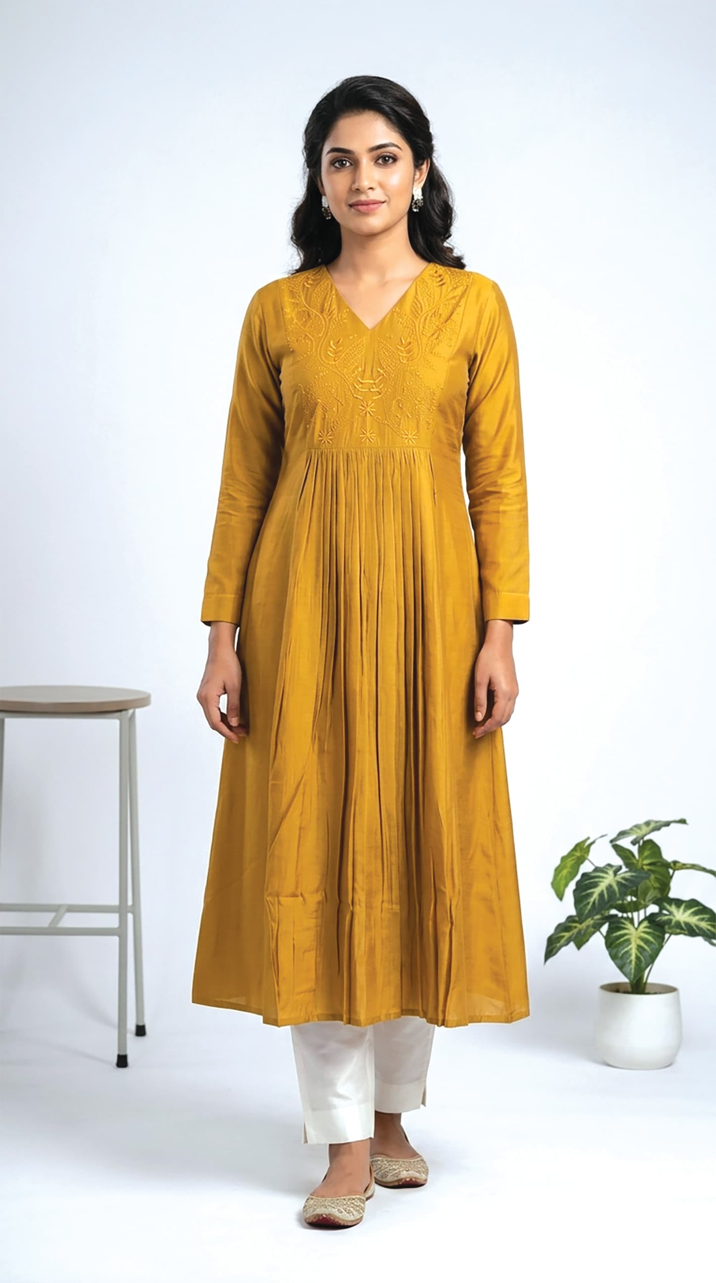 Mustard pintuck-pleated anarkali with an embroidered yoke