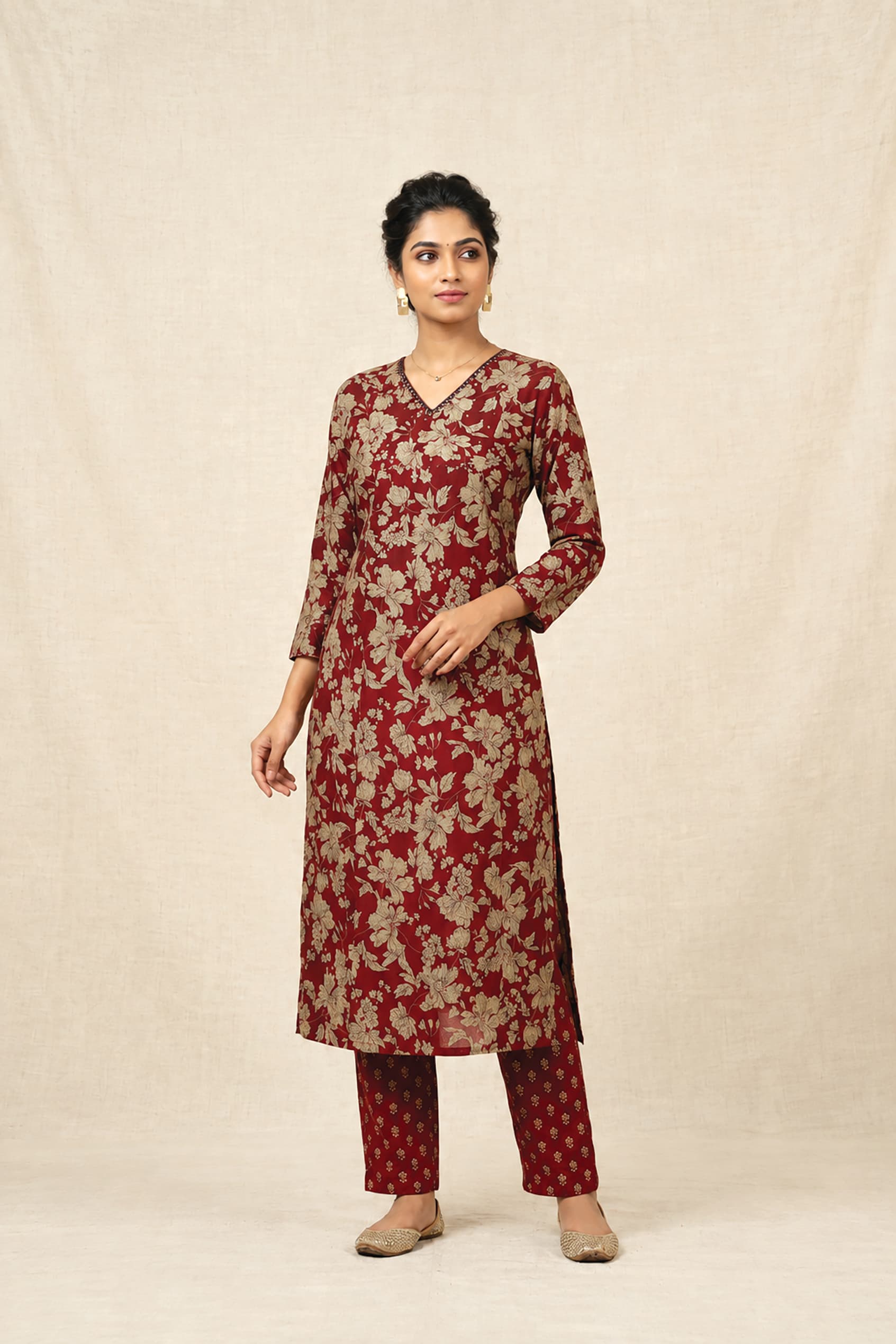 Varsha — Maroon-and-gold floral-print kurta with matching printed churidar
